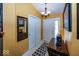 Inviting foyer with tile flooring, closet, and decorative mirror, setting a warm tone at 5982 Blue Heron Way, Plainfield, IN 46168