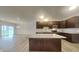 Modern kitchen with granite countertops, stainless steel appliances, and island at 6118 Aspen Meadow Dr, Indianapolis, IN 46237