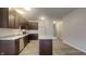 Beautiful kitchen with stainless steel appliances, island, and dark wood cabinets at 6118 Aspen Meadow Dr, Indianapolis, IN 46237