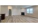 Open-concept living room with cozy fireplace and plenty of natural light at 6118 Aspen Meadow Dr, Indianapolis, IN 46237