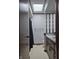 Bright bathroom featuring a vanity with modern fixtures and a skylight at 628 Williams Ct, Greenwood, IN 46142