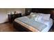 Comfortable bedroom with a plush bed, dresser, and soft, neutral tones at 628 Williams Ct, Greenwood, IN 46142