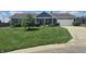 Charming single-story home featuring a well-maintained lawn and classic curb appeal at 628 Williams Ct, Greenwood, IN 46142