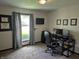 Functional home office with a desk, computer setup, and natural light at 628 Williams Ct, Greenwood, IN 46142