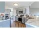 Updated kitchen with stainless steel appliances, marble countertops, modern cabinetry and hardwood floors at 6602 Cobden Ct, Indianapolis, IN 46254