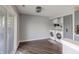 Laundry area with side-by-side washer and dryer, storage cabinets, and access to backyard at 6602 Cobden Ct, Indianapolis, IN 46254