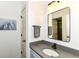 Stylish bathroom featuring a modern sink, sleek mirror, and elegant lighting fixtures at 6655 Westminster Dr, Zionsville, IN 46077