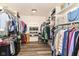 Spacious walk-in closet featuring custom shelving and ample storage space at 6655 Westminster Dr, Zionsville, IN 46077