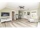Spacious living room featuring hardwood floors and ample natural light at 6655 Westminster Dr, Zionsville, IN 46077