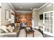 Comfortable home office featuring a built-in desk, shelving, and stylish decor at 6655 Westminster Dr, Zionsville, IN 46077