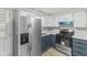 Well-equipped kitchen featuring stainless steel appliances, modern countertops, and ample storage at 729 S Holmes Ave, Indianapolis, IN 46221