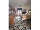 Bedroom featuring floral carpet, large bed and wardrobe with natural light at 7901 Oaklandon Rd, Indianapolis, IN 46236