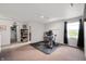 Bonus room featuring neutral paint, carpet, and window at 8211 Firefly Way, Indianapolis, IN 46259