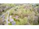 Aerial view of a home with multiple outbuildings, mature trees, offering a peaceful, private setting at 8329 S Christian Dr, Nineveh, IN 46164