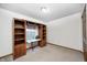 Spare bedroom featuring a large built-in shelving unit and an abundance of natural light at 8329 S Christian Dr, Nineveh, IN 46164