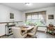 Traditional dining room features neutral paint, tile floor and modern wood trim at 8329 S Christian Dr, Nineveh, IN 46164