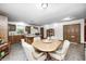Open concept kitchen and dining room features tile floors and recessed lighting at 8329 S Christian Dr, Nineveh, IN 46164