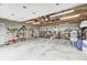 Spacious two-car garage with ample storage and a variety of tools, providing functionality and organization at 8329 S Christian Dr, Nineveh, IN 46164