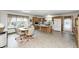 Inviting kitchen with wood cabinets, a breakfast bar, and a cozy dining area at 8329 S Christian Dr, Nineveh, IN 46164