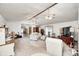 Spacious living room with vaulted ceilings, ceiling fans, and neutral-toned furniture at 8329 S Christian Dr, Nineveh, IN 46164