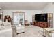 Bright and airy living room with a comfortable seating area and a view of the backyard at 8329 S Christian Dr, Nineveh, IN 46164
