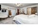 Spacious main bedroom features carpet floors, ceiling fan and french doors to the patio at 8329 S Christian Dr, Nineveh, IN 46164