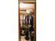 An organized closet filled with clothes, shoes, and storage containers at 9067 Old Haggard Rd, Morgantown, IN 46160