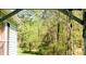 Inviting porch with bright natural light and scenic view of lush greenery at 9067 Old Haggard Rd, Morgantown, IN 46160