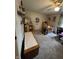 Spacious bedroom with neutral carpet and ample storage; furniture with light wood finish adds comfort at 9415 Timber View Dr, Indianapolis, IN 46250