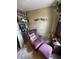 Cozy bedroom with a comfy rocking chair and built-in bookshelves for a relaxing atmosphere at 9415 Timber View Dr, Indianapolis, IN 46250