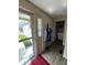 Bright entryway with coat rack and view into another room, creating a welcoming atmosphere at 9415 Timber View Dr, Indianapolis, IN 46250