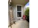 Inviting front porch with 'Welcome' sign and decorative accents, creating a warm and friendly entrance at 9415 Timber View Dr, Indianapolis, IN 46250
