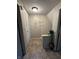 Hallway featuring stylish flooring, decorative wall art, and ample closet space for storage at 9415 Timber View Dr, Indianapolis, IN 46250