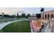 Outdoor amphitheater with tiered seating, a stage, and lush greenery for community events and performances at 953 Udell St, Indianapolis, IN 46208