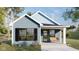 Charming single-Gathering home with horizontal siding, black shutters, front porch, and an inviting swing at 953 Udell St, Indianapolis, IN 46208