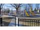 Community playground with colorful equipment, slides, and climbing structures for recreation at 953 Udell St, Indianapolis, IN 46208