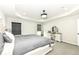 Bright bedroom with a comfortable bed, classic vanity, and neutral decor at 9920 Deep Royal Way, Indianapolis, IN 46239