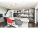 Spacious kitchen with granite countertops, dark cabinets and stainless steel appliances at 9920 Deep Royal Way, Indianapolis, IN 46239