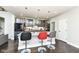 Modern kitchen with granite countertops, stylish lighting, and a convenient breakfast bar with seating at 9920 Deep Royal Way, Indianapolis, IN 46239