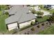 Aerial of the home’s manicured backyard with lush greenery and landscaping, offering a private outdoor retreat at 10138 Backstretch Row, Fishers, IN 46040