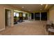 This finished basement features an exercise area, bar, and entertainment area, ready for anything! at 10138 Backstretch Row, Fishers, IN 46040