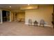 Versatile basement area perfect for recreation, featuring neutral colors, comfortable seating, and ample space at 10138 Backstretch Row, Fishers, IN 46040
