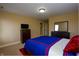 Comfortable bedroom with large window, carpeted floor, and traditional decor at 10138 Backstretch Row, Fishers, IN 46040