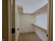 Ensuite closet featuring shelving and plenty of room for organizing your entire wardrobe at 10138 Backstretch Row, Fishers, IN 46040