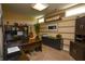 Well-appointed office space with ample storage, desk area, and natural light, perfect for productivity at 10138 Backstretch Row, Fishers, IN 46040