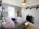 Comfortable bedroom boasting a cozy bed, soft lighting, and unique decorative elements at 10190 Holly Berry Cir, Fishers, IN 46038