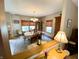 Bright dining room with classic furniture and natural light from the windows at 10190 Holly Berry Cir, Fishers, IN 46038