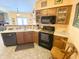 Well-lit kitchen features modern appliances and ample counter space at 10190 Holly Berry Cir, Fishers, IN 46038