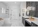 Elegant bathroom with double vanity, walk-in glass shower, and soaking tub at 10590 Geist View Dr, Fishers, IN 46055