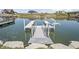 A well-maintained dock provides easy access to the calm lake waters, ideal for boating and water activities at 10590 Geist View Dr, Fishers, IN 46055